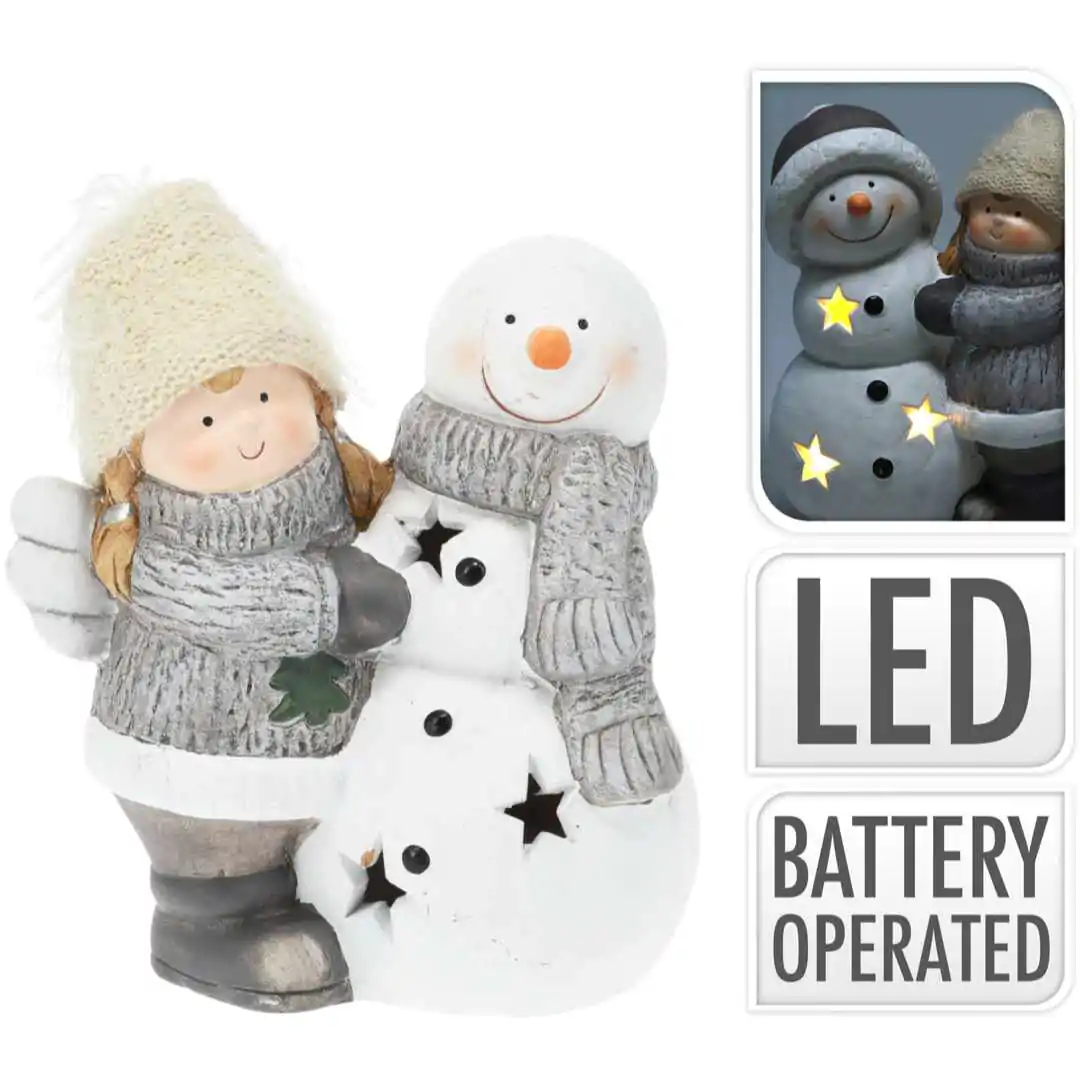 פסלון דקורטיבי עם תאורת לד ילדה עם איש שלג 17 ס"מ